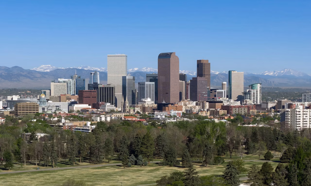 Denver’s skyline with mountains in the distance