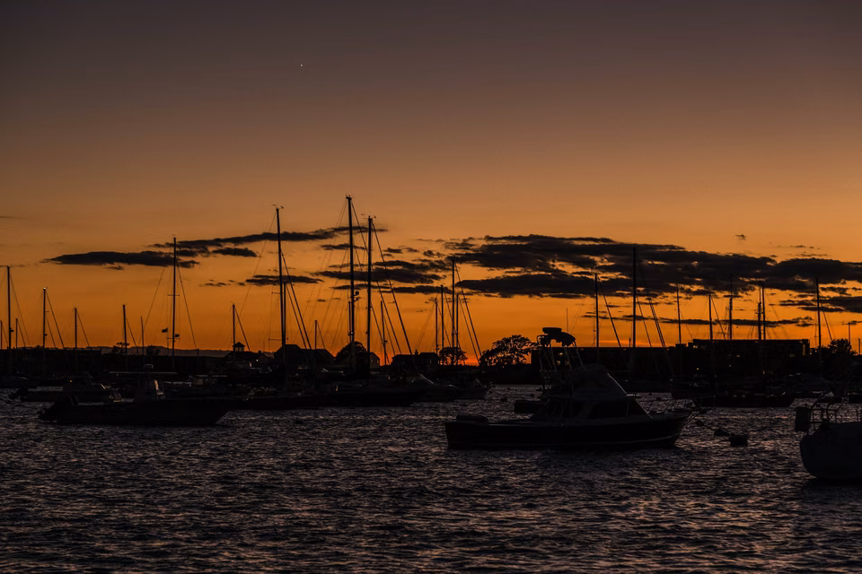 Newport Harbor · Boats on the water at dusk