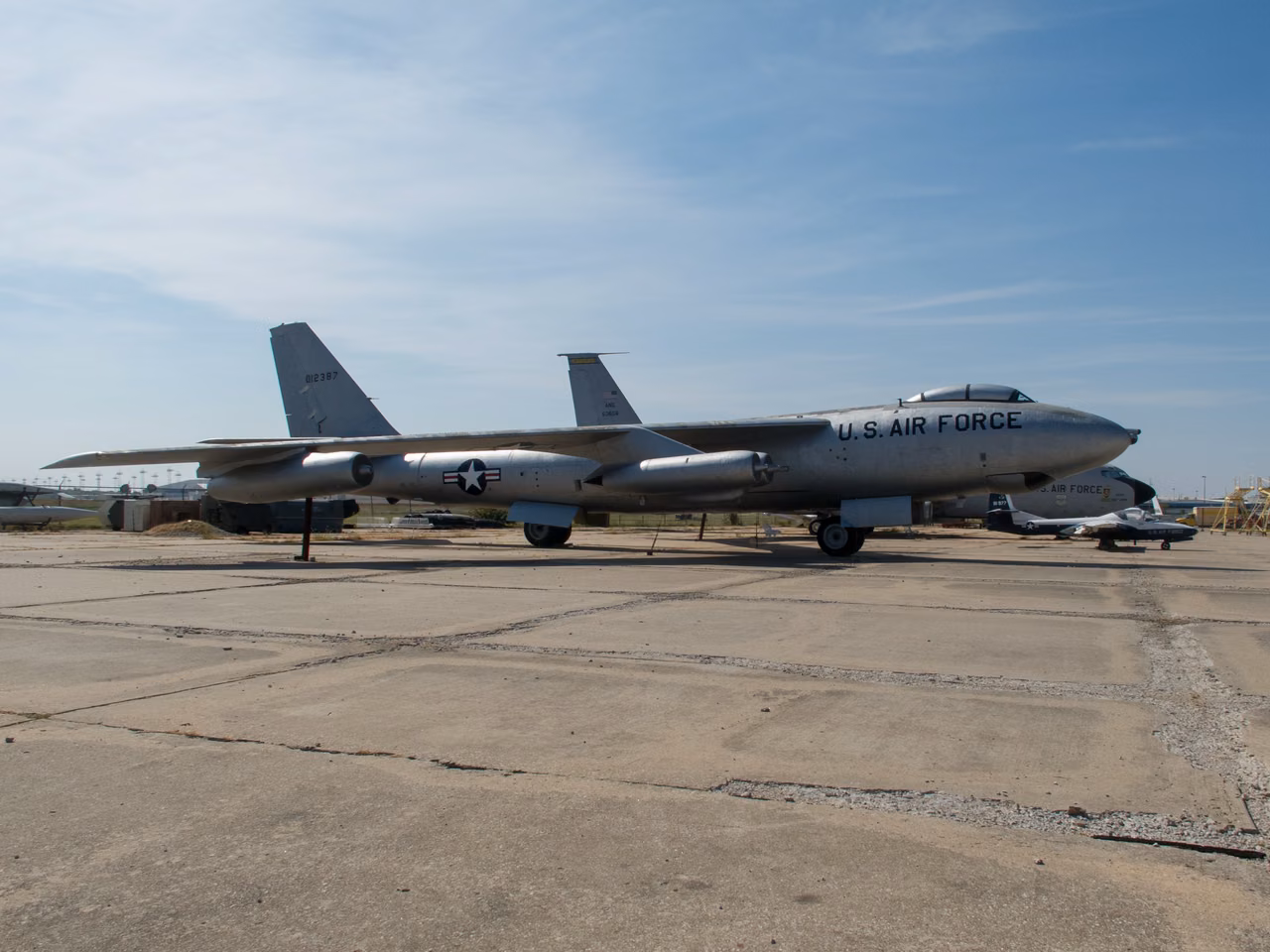 B-47 airplane displayed outdoors at the Kansas Aviation Museum.