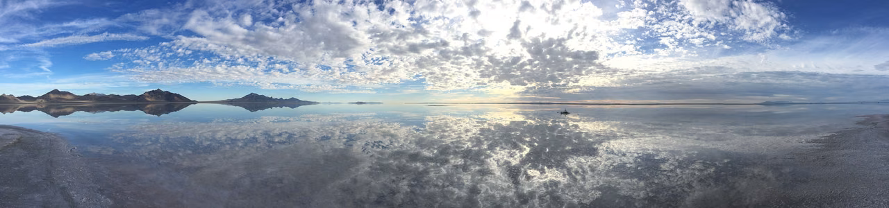 Bonneville Salt Flats · Shallow water reflecting the sky and mountains