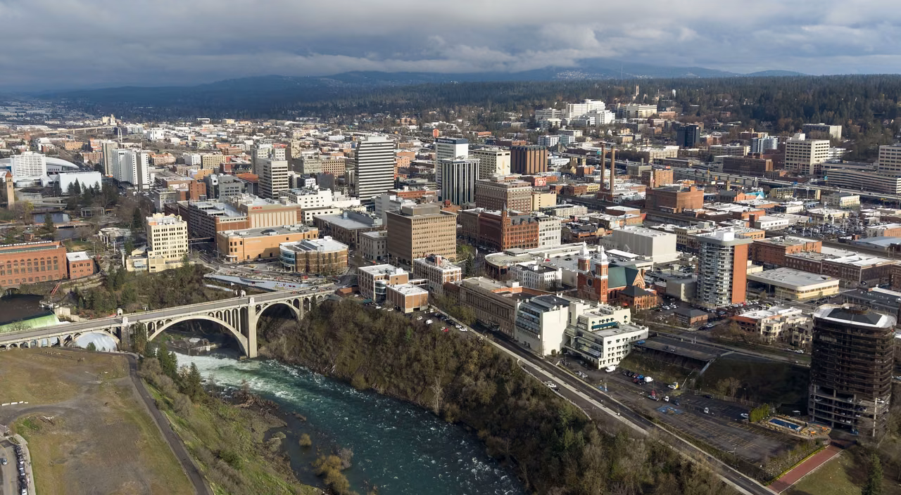 Aerial view of the downtown Spokane · River flows through the city.